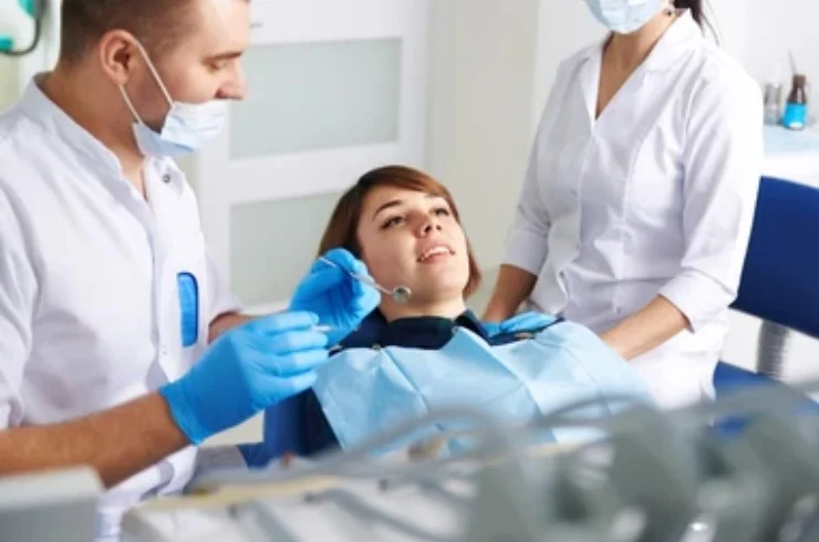 examining a dental patient in a dental cinic